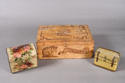 a small wooden box and a small wooden box on a table