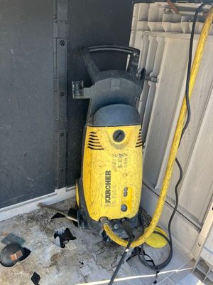 an image of a yellow and black vacuum on the floor