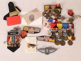 a lot of medals and other items that are on the table