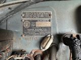 a close up view of a car engine with a plaque on it