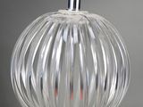 an image of a clear glass ball hanging from a ceiling