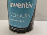 an image of a can of paint sitting on a table