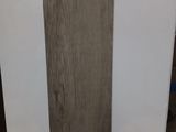 a close up of a piece of wood with a price tag on it