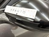 a sticker on the side mirror of a car