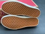 vans off the wall slip on sneakers in white and pink box