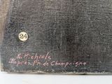 an old book with writing on it sitting on top of a table