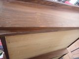 a close up of a piece of wood on a table