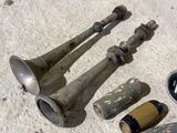 a lot of old items that are laying out on the ground