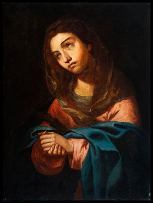un tableau représentant une femme tenant un chapelet entre ses mains