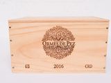 a close up of a wooden box with a label on it