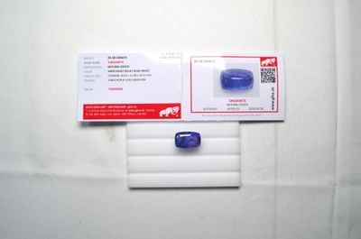 une photo d'une carte de visite sur laquelle figure l'image d'une brosse à dents