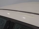 a close up of a car ' s roof with the sunroof
