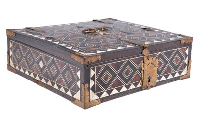 a wooden box with a decorative design on it