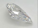 a close up of a diamond on a white surface