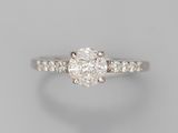 a diamond ring with a single stone in the center