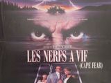 On voit l'affiche du film « Les Nevres ont la vie ».