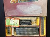 a box with a train set inside of it