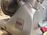 a machine that is sitting on top of a wooden table