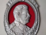 a close up of a silver and red picture frame with a picture of a man