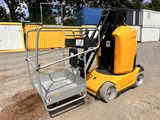 a forklift that is sitting in the dirt