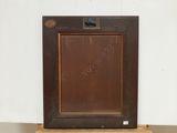 an image of a picture of a wooden frame with writing on it