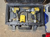 two tools in a tool box on the floor