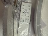 a remote control sitting on top of a plastic bag