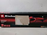 an empty box of a knife sharper sitting on a table