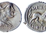 a close up of a coin with a horse on it