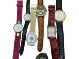 a lot of different watches on a white background