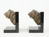 pair of art deco bookends in the form of a lion ' s head