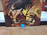 a picture of a painting on a table in a room