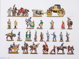 de nombreuses figurines représentant des personnes à cheval ou dans des calèches