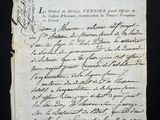a piece of paper with writing on it sitting on top of a table
