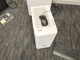 two computer monitors and a keyboard on the floor