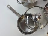 many pots and pans that are on the table
