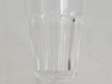 a glass that is sitting on a table