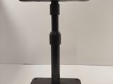 an image of a tv on a stand on a white surface