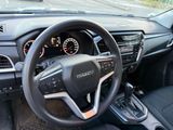 the interior of a car with a steering wheel, dashboard, and dash board