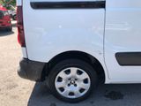a white van that is parked in a parking lot