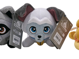 three stuffed animals sitting next to each other on a white background