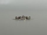 an image of a diamond ring on a table