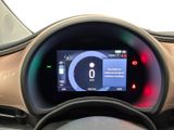 the dashboard of a car with a digital display on it