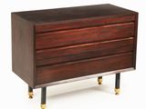 an image of a wooden chest of drawers with brass legs