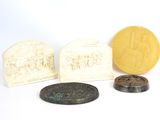 several different types of soaps and soap bars on a white surface