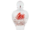 a glass vase with a red flower inside of it