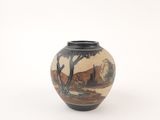 a small vase with a painting on it sitting on a table