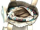 a purse that has a handle and a strap on it