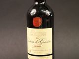 a bottle of wine that is sitting on a table