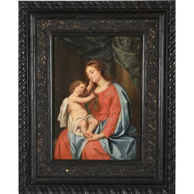 une peinture représentant une femme tenant un enfant sur ses genoux